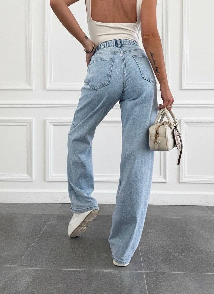 PLATIE DŽINSI AR AUGSTU JOSTAS VIETU